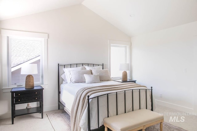 6104 S Apex Ave, Meridian, ID 83642 - bedroom with lofted ceiling and light colored carpet