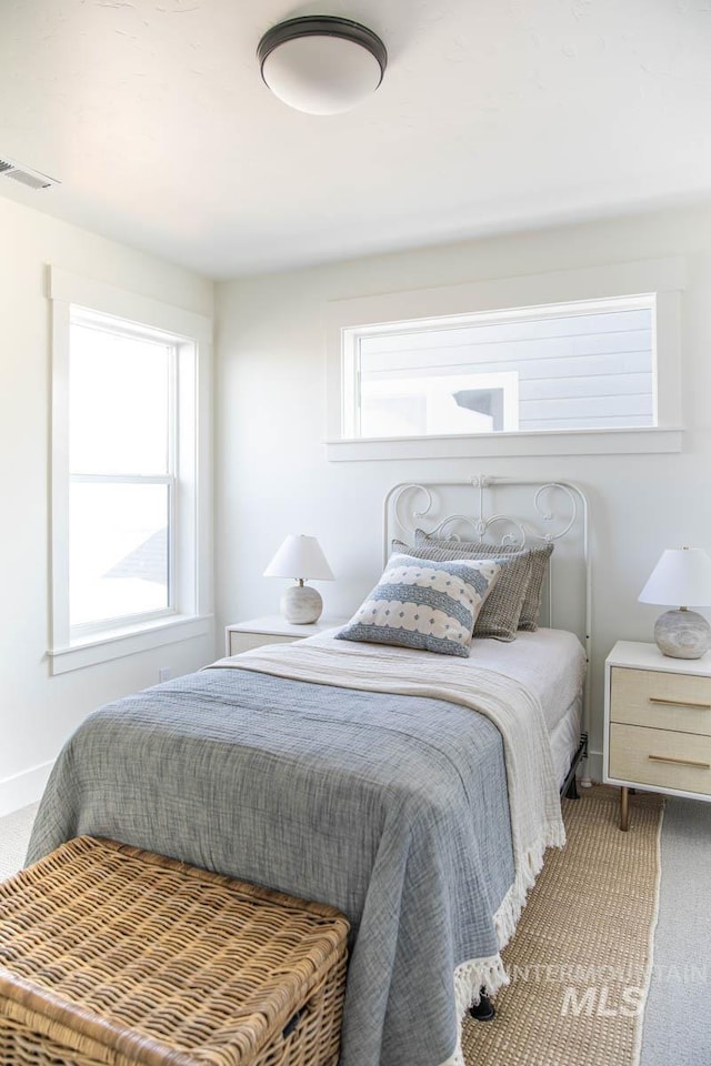 6104 S Apex Ave, Meridian, ID 83642 - bedroom featuring carpet floors and baseboards