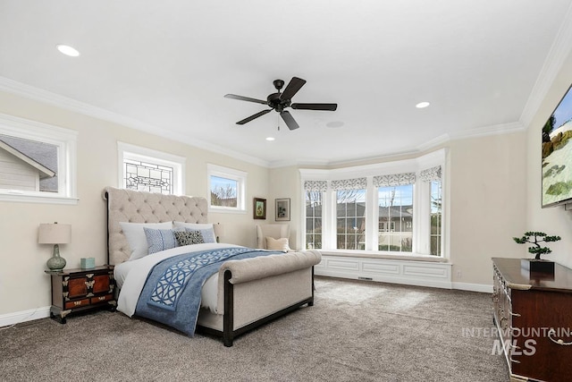 bedroom with carpet flooring, ceiling fan, and crown molding