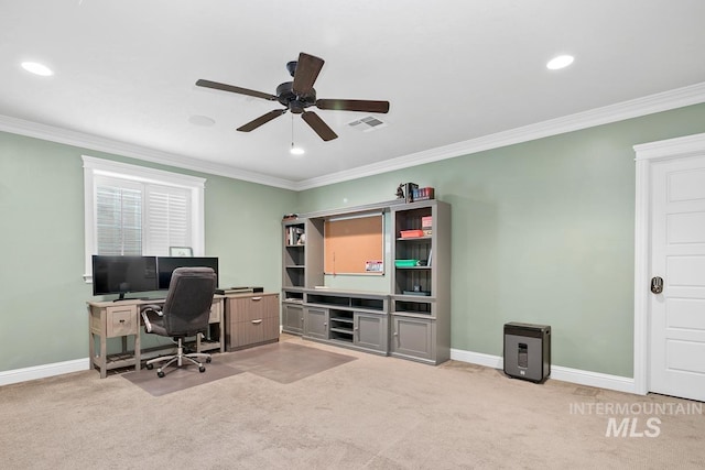 carpeted office space featuring ceiling fan and ornamental molding