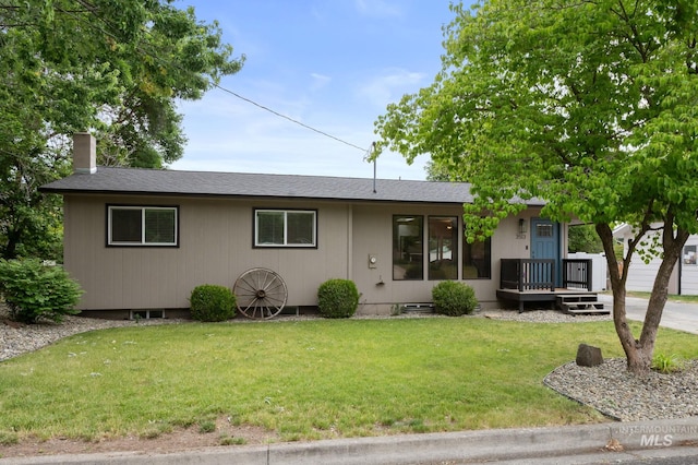 3513 7th St E, Lewiston, ID 83501 - single story home with a front lawn, a chimney, and roof with shingles