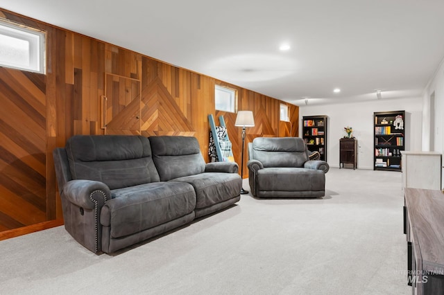 3513 7th St E, Lewiston, ID 83501 - carpeted living room featuring wood walls and plenty of natural light