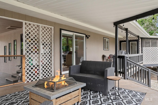 3513 7th St E, Lewiston, ID 83501 - wooden terrace featuring an outdoor living space with a fire pit
