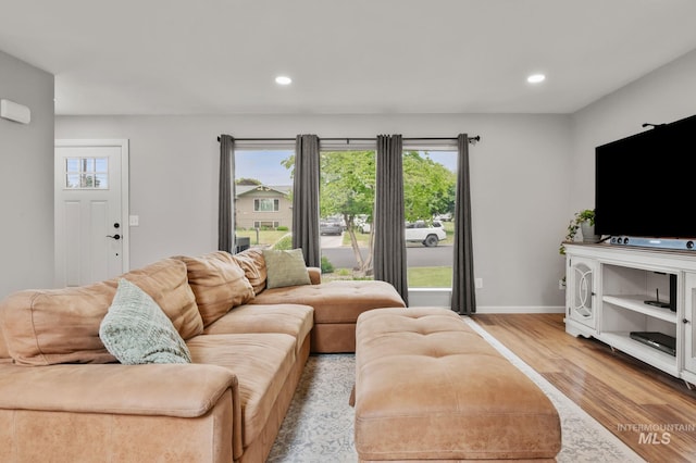 3513 7th St E, Lewiston, ID 83501 - living area with light wood finished floors, plenty of natural light, and recessed lighting