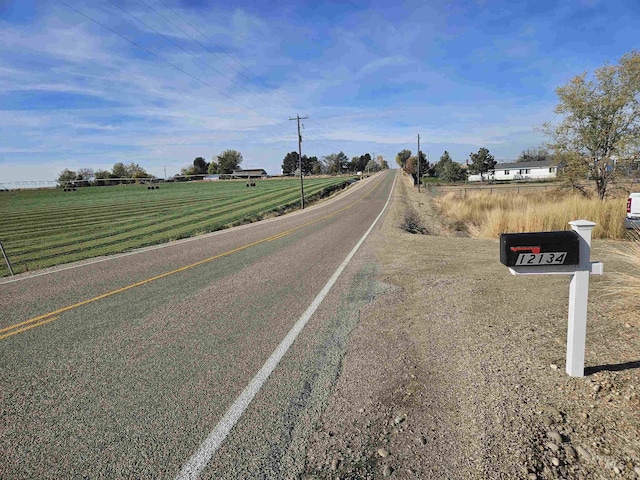 view of road with a rural view