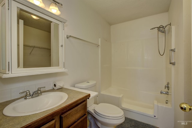 full bathroom featuring backsplash, shower / bath combination, vanity, a textured ceiling, and toilet