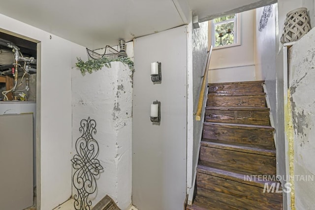 staircase featuring water heater