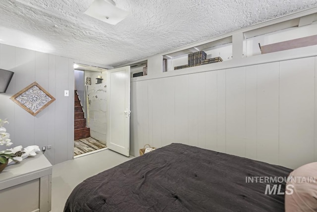 bedroom featuring a textured ceiling