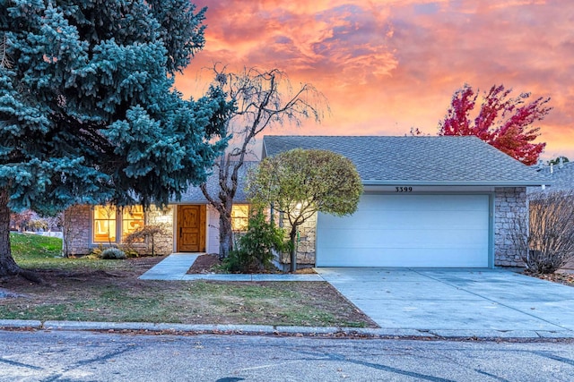 ranch-style home with a garage