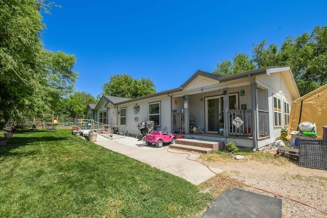518 N 42nd, Nampa, ID 83687 - rear view of property with a lawn and a porch