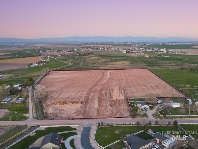 aerial view at dusk with a rural view