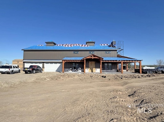 view of front of house featuring driveway and an attached garage