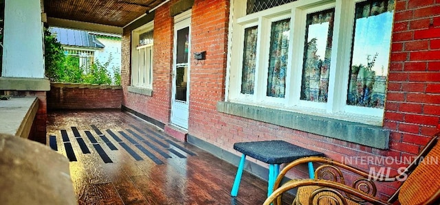view of patio featuring a porch