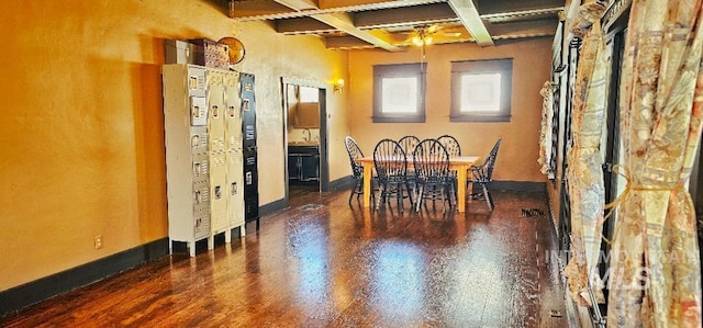 dining room featuring beamed ceiling, coffered ceiling, a ceiling fan, and baseboards