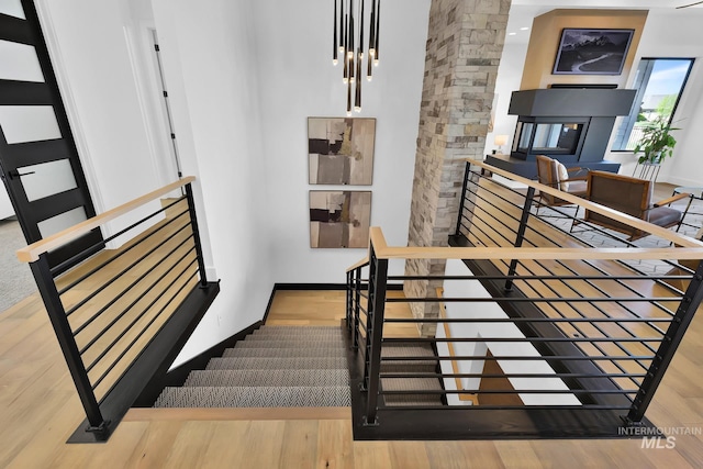 6553 S Pemberley Way, Meridian, ID 83642 - stairs featuring wood finished floors and baseboards