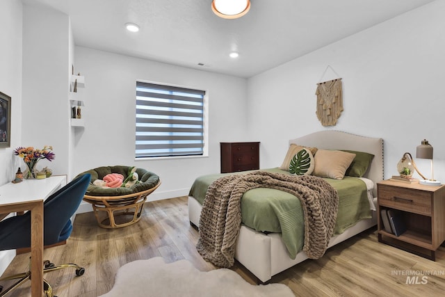 6553 S Pemberley Way, Meridian, ID 83642 - bedroom featuring wood finished floors and recessed lighting