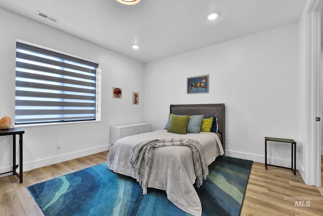 6553 S Pemberley Way, Meridian, ID 83642 - bedroom featuring wood finished floors, baseboards, and recessed lighting