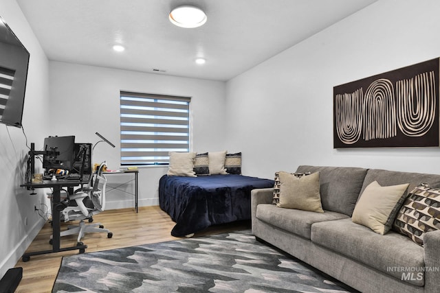 6553 S Pemberley Way, Meridian, ID 83642 - bedroom with wood finished floors, baseboards, an office area, and recessed lighting