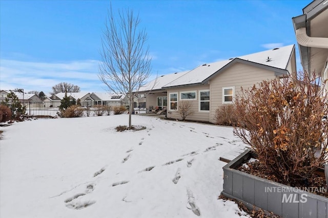 view of yard covered in snow