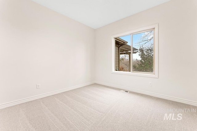 view of carpeted spare room