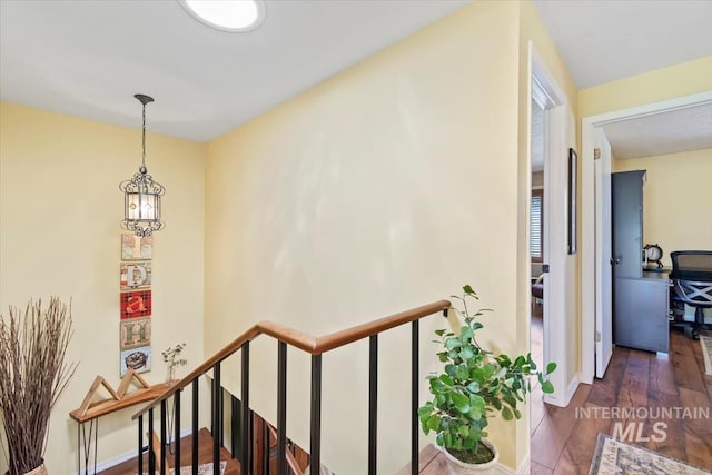 3001 S Roosevelt St Unit 9, Boise, ID 83705 - staircase with baseboards and wood finished floors