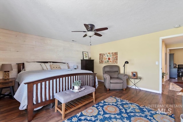 3001 S Roosevelt St Unit 9, Boise, ID 83705 - bedroom featuring wood finished floors, baseboards, ceiling fan, and a textured ceiling