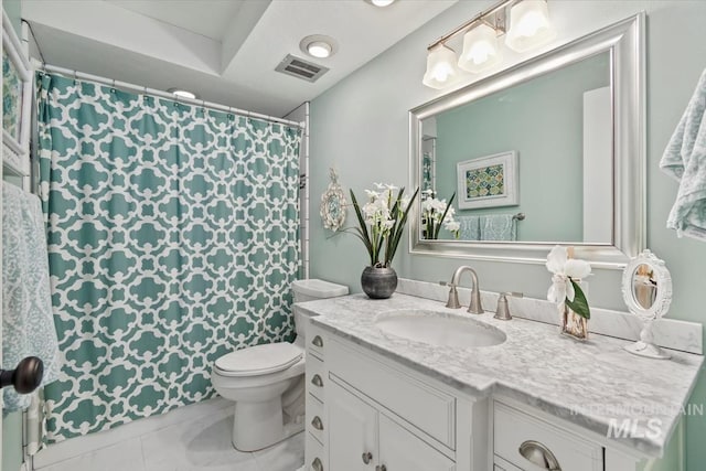 3001 S Roosevelt St Unit 9, Boise, ID 83705 - full bath featuring vanity, toilet, tile patterned flooring, and curtained shower