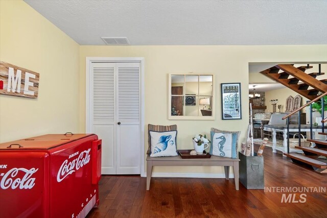 3001 S Roosevelt St Unit 9, Boise, ID 83705 - living area with stairway and wood-type flooring