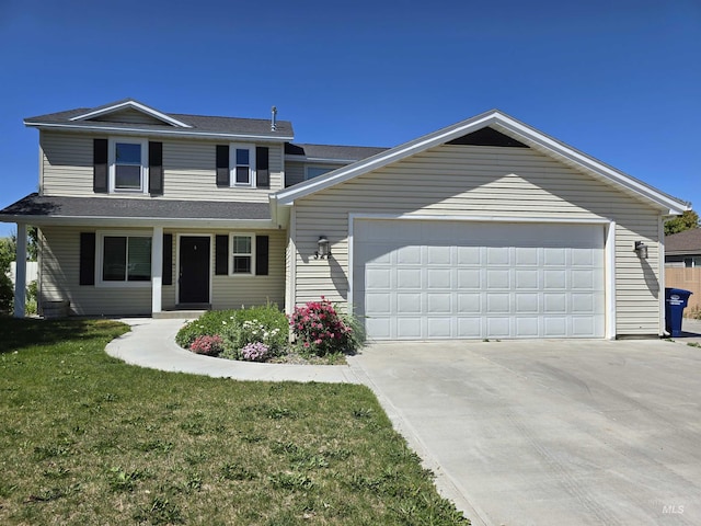 322 Linden Ave, Twin Falls, ID 83301 - traditional home with concrete driveway, a front yard, an attached garage, and a shingled roof