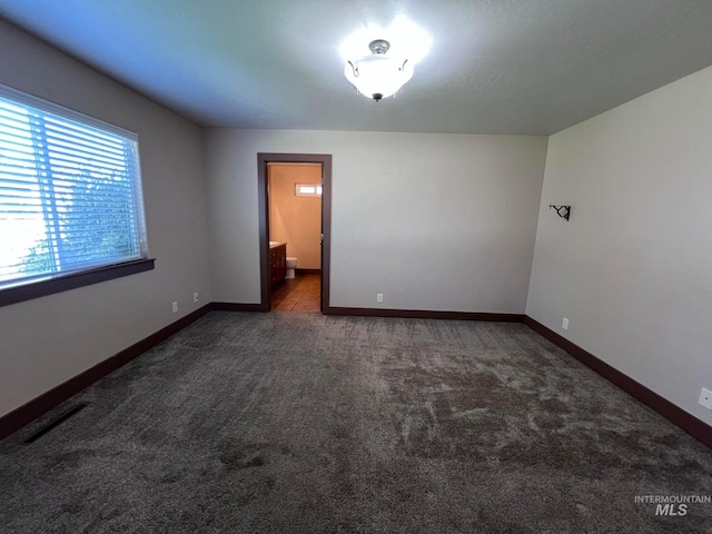 322 Linden Ave, Twin Falls, ID 83301 - carpeted spare room featuring baseboards