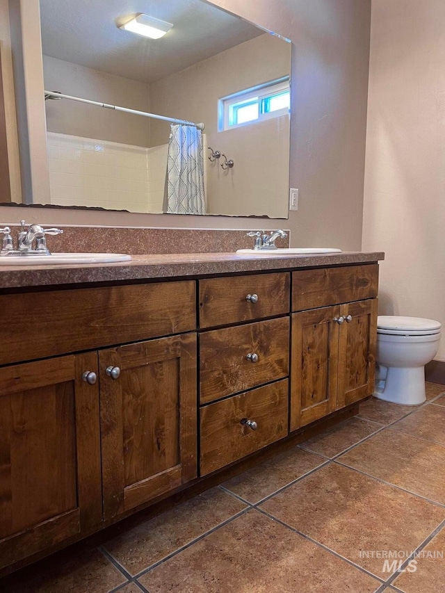 322 Linden Ave, Twin Falls, ID 83301 - full bath with double vanity, toilet, tile patterned flooring, and a shower with curtain