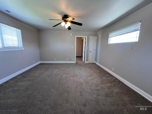 322 Linden Ave, Twin Falls, ID 83301 - unfurnished bedroom featuring carpet, baseboards, and ceiling fan