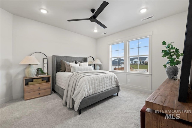 carpeted bedroom featuring ceiling fan