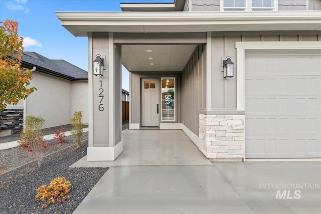 property entrance featuring a garage