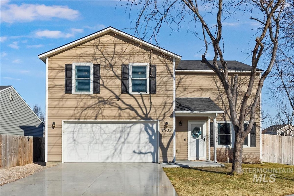 front facade with a garage