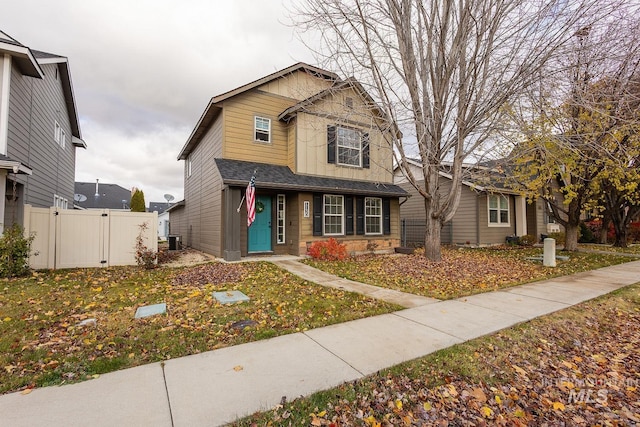 craftsman inspired home featuring cooling unit