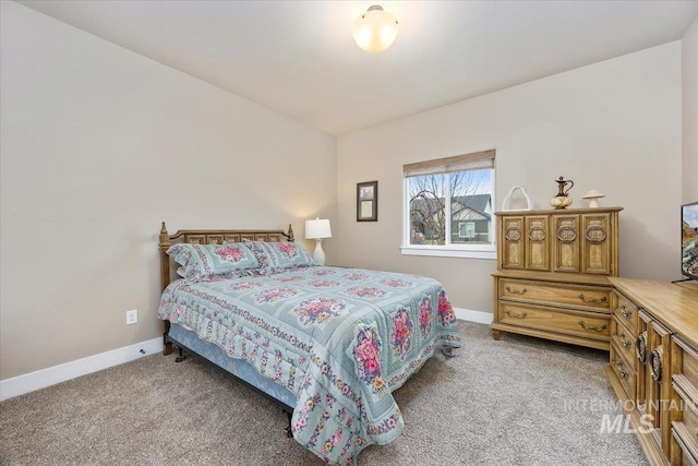 bedroom with light carpet