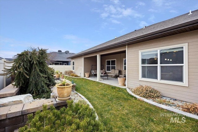 view of yard featuring a patio area and outdoor lounge area