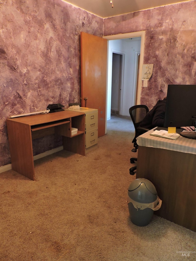 office with light colored carpet and visible vents