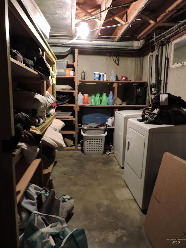 unfinished basement with washing machine and dryer