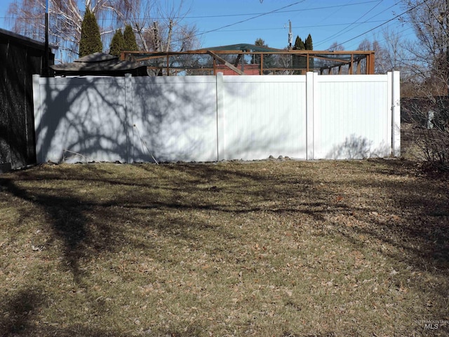 view of yard with fence