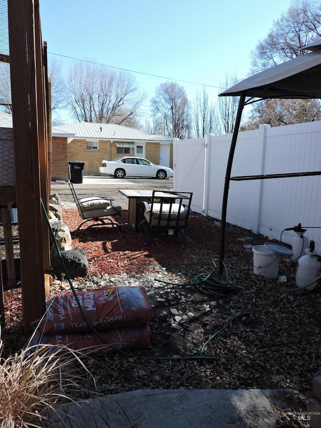 view of yard with a gate and fence