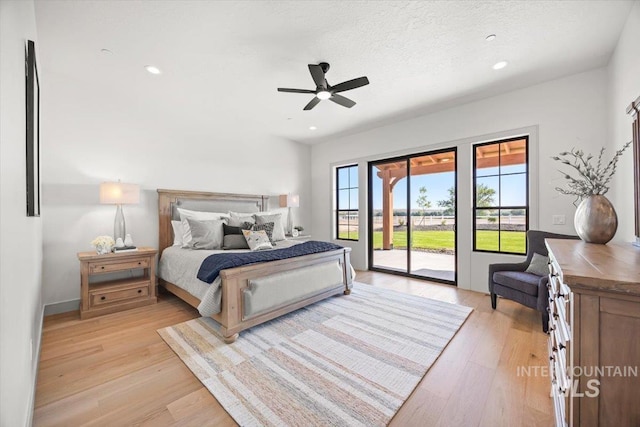 8860 Kemp Rd, Middleton, ID 83607 - bedroom with access to outside, light wood-type flooring, recessed lighting, and ceiling fan