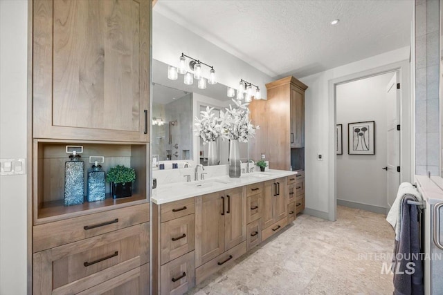 8860 Kemp Rd, Middleton, ID 83607 - full bath featuring double vanity, a textured ceiling, and baseboards