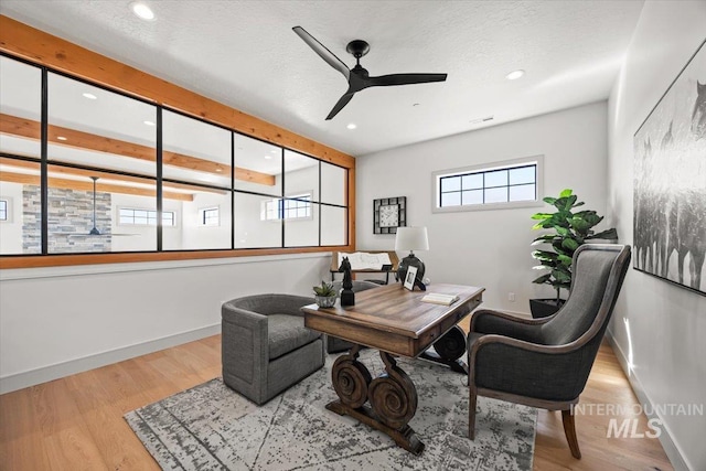 8860 Kemp Rd, Middleton, ID 83607 - office space featuring ceiling fan, recessed lighting, wood finished floors, and baseboards