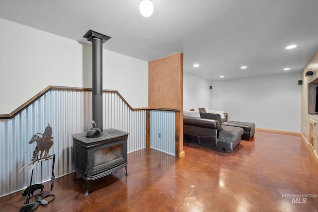 living room featuring a wood stove