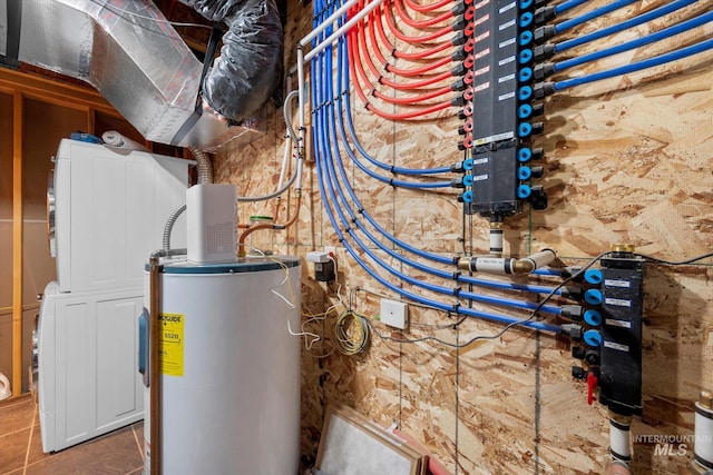 utility room featuring water heater