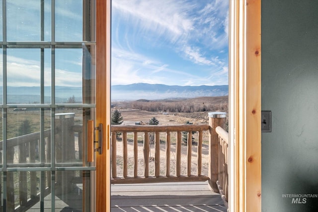 balcony featuring a mountain view