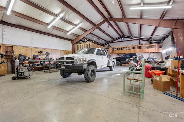 garage with a workshop area