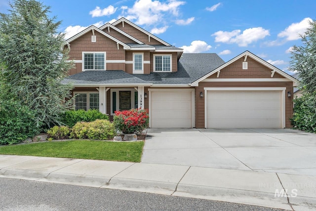 13991 W Milford Dr, Boise, ID 83713 - craftsman inspired home featuring an attached garage, concrete driveway, roof with shingles, and a front yard